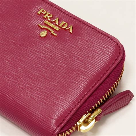 prada saffiano coin purse.